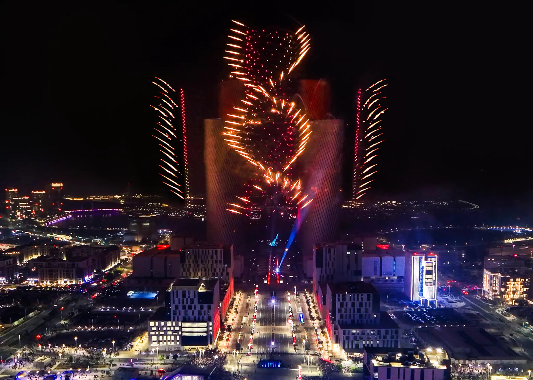 Record-breaking fireworks and drone show by Pyroemotions featuring synchronized launches across 14 buildings and 4 towers for an immersive experience